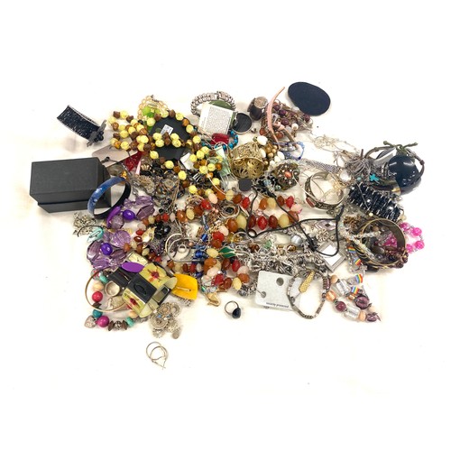 591 - Large selection of costume jewellery includes perfume bottles etc