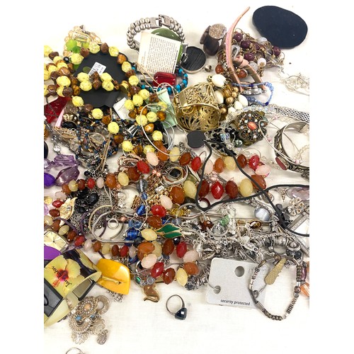 591 - Large selection of costume jewellery includes perfume bottles etc