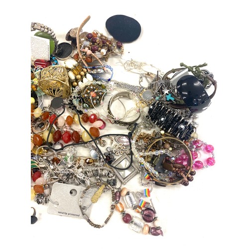 591 - Large selection of costume jewellery includes perfume bottles etc