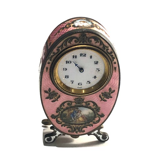 548 - 19th century pink guilloche enamel boudoir desk clock with cherub panels and Watteauesque panel of l... 