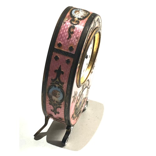 548 - 19th century pink guilloche enamel boudoir desk clock with cherub panels and Watteauesque panel of l... 