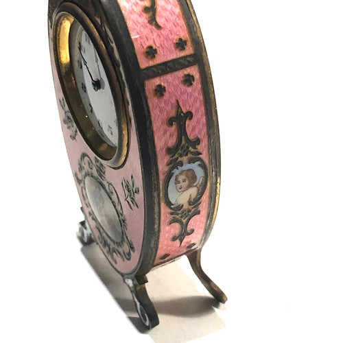 548 - 19th century pink guilloche enamel boudoir desk clock with cherub panels and Watteauesque panel of l... 