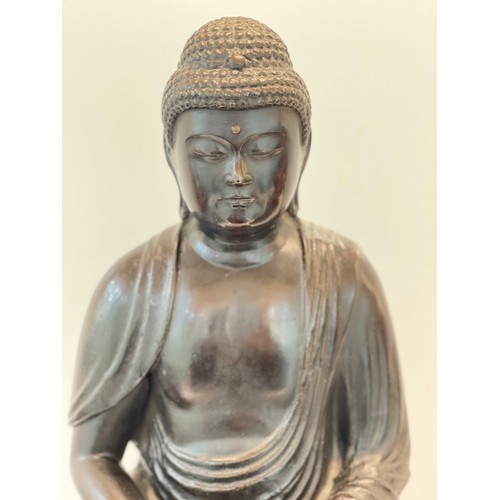 557 - Late 17th early 18th century Japanese bronze seated Buddha on lotus throne the reverse signed , dark... 