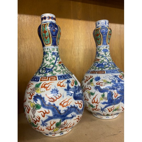 84 - Pair of Oriental vases measure approx 9.5