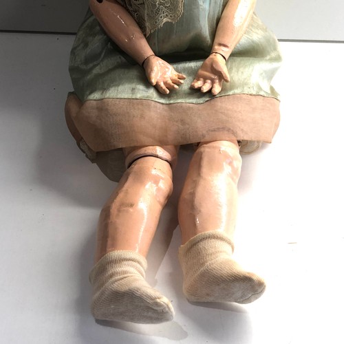 572 - Antique 24 in German china head jointed body doll body and head in good condition