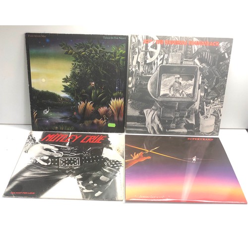 579 - 4 vintage lps includes 10cc fleetwood mac supertramp and motley crue