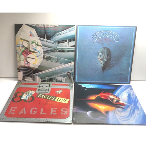 585 - 4 vintage lps includes the alan parsons project 1 robot eagles zz top afterburner and eagles there g... 