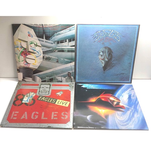 585 - 4 vintage lps includes the alan parsons project 1 robot eagles zz top afterburner and eagles there g... 