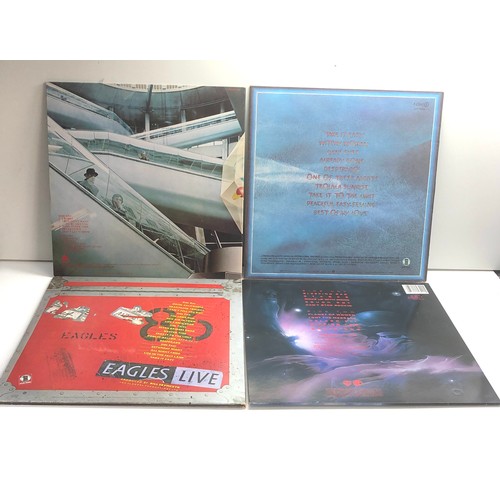 585 - 4 vintage lps includes the alan parsons project 1 robot eagles zz top afterburner and eagles there g... 