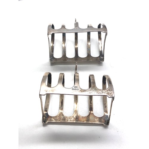 4 - Pair of edward viners silver toast racks Sheffield silver hallmarks weight 107g