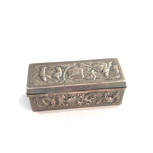 12 - Antique chinese silver hinged lid box measures approx 9.5cm by 3.8cm height 3.5cm chinese scenic sil... 