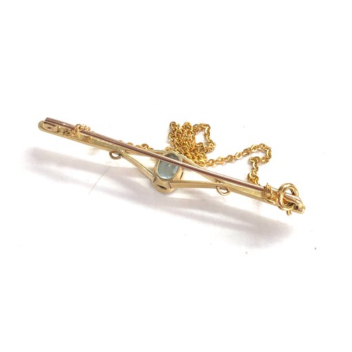 166 - Fine 18ct gold Aquamarine brooch  central aquamarine measures approx 10mm by 6.5cm est 1.30ct measur... 