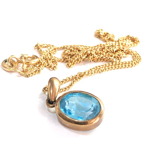 167 - 9ct gold Topaz pendant and chain topaz pendant measures approx 18mm drop by 9mm wide chain measures ... 