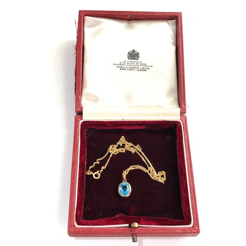 167 - 9ct gold Topaz pendant and chain topaz pendant measures approx 18mm drop by 9mm wide chain measures ... 