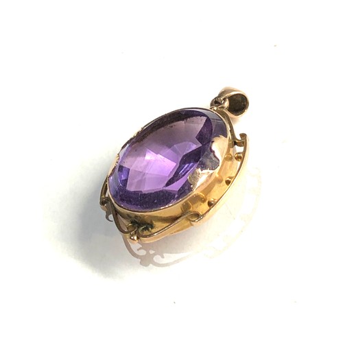 413 - 9ct gold antique ornate amethyst pendant (8.4g) 3.8cm drop