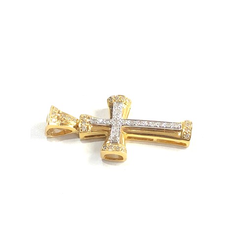 355 - 9ct gold diamond cross pendant (3.6g) measures approx 3.5cm by 1.7cm wide