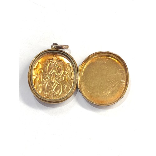 388 - 9ct gold front & back vintage locket (5.7g) xrt tested as 9ct gold bk & front