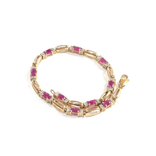 297 - 9ct gold diamond and ruby link bracelet (5.8g)