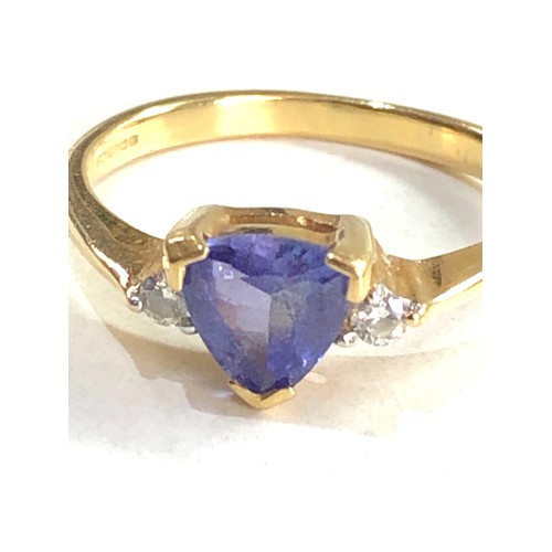 380 - 18ct gold tanzanite and diamond ring (2.4g)