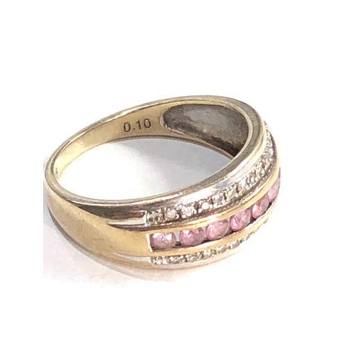 401 - 9ct gold  diamond and pink stone triple row ring (2.8g)