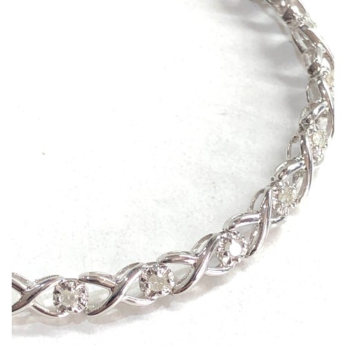 392 - 9ct white gold diamond detail tennis bracelet (5.4g)