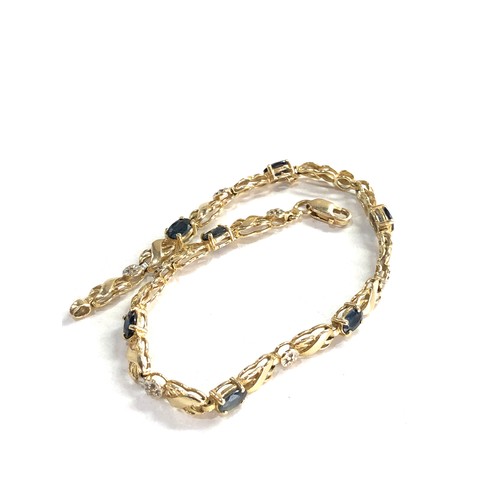 287 - 14ct gold sapphire & diamond tennis bracelet (5.4g)