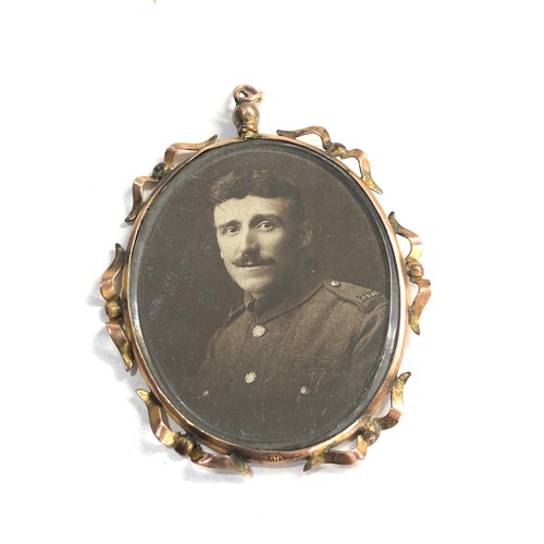 397 - large 9ct gold frame antique double sided ww1 photograph Locket (14.7g) measures approx 6cm by 4.6cm... 