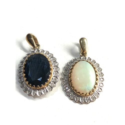 292 - 2 x 9ct gold pendants inc. diamond, opal (5.7g)