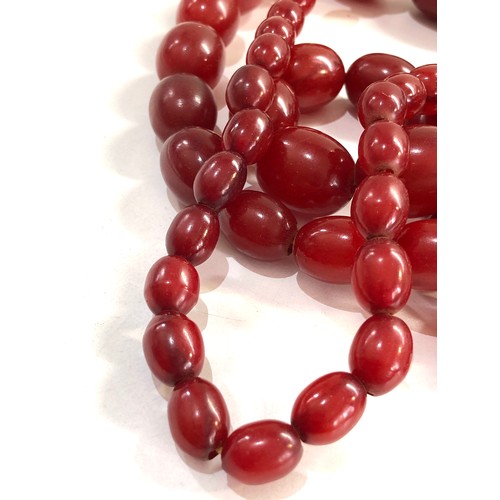 476 - Cherry amber bakelite bead necklace with internal streaking 193g