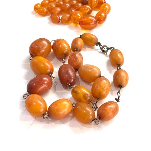 468 - 2 x  amber bead necklaces 53g