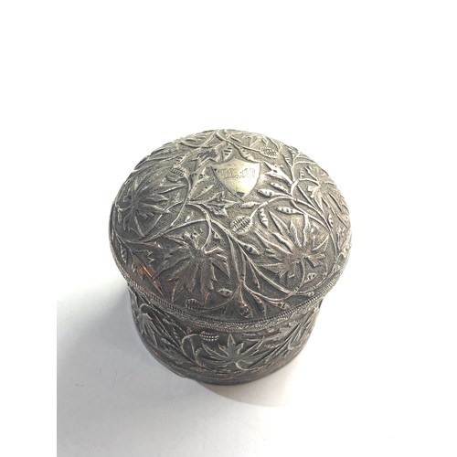 54 - Asian silver lidded round box leaf embossed measures approx 7.6cm dia height 6.7cm weight 146g xrt a... 