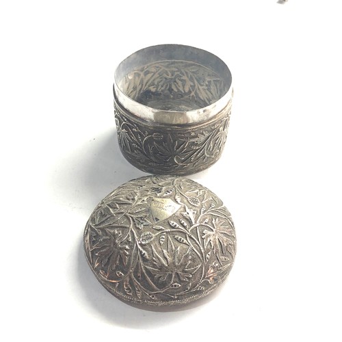 54 - Asian silver lidded round box leaf embossed measures approx 7.6cm dia height 6.7cm weight 146g xrt a... 