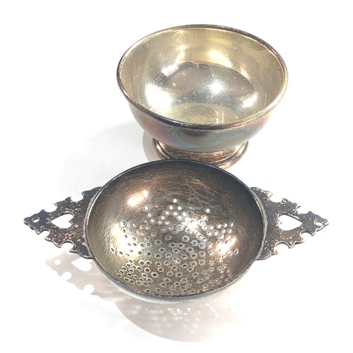 56 - Silver tea strainer and bowl weight 105g London silver hallmarks