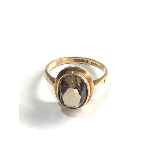 88 - 9ct gold smoky ring 2.6g