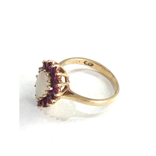 99 - 9ct gold ruby & opal ring 3.1g