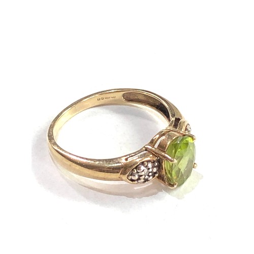 174 - 9ct gold peridot & diamond ring 2.5g