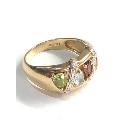 210 - 9ct gold peridot citrine aqua garnet & diamond ring 4.3g