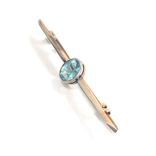 238 - Antique 9ct white and yellow gold blue stone bar brooch measures approx 5.5cm long weight 2.2g