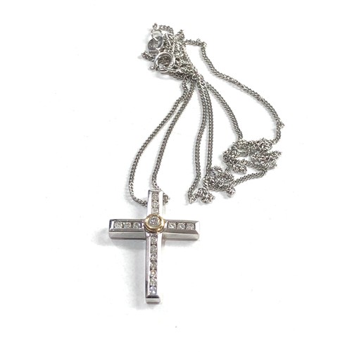 258 - 9ct white gold diamond cross and 9ct gold chain cross measures approx 2.1cm drop set with 0.22ct dia... 