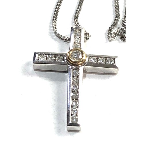 258 - 9ct white gold diamond cross and 9ct gold chain cross measures approx 2.1cm drop set with 0.22ct dia... 