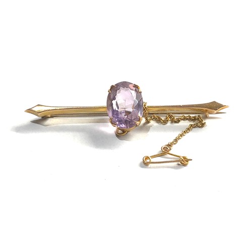 278 - 9ct gold amethyst bar brooch measures approx 6.1cm 4.2g