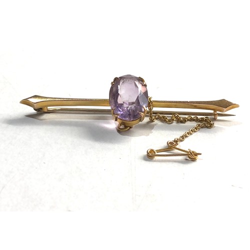 278 - 9ct gold amethyst bar brooch measures approx 6.1cm 4.2g