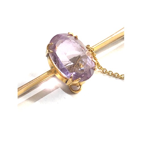 278 - 9ct gold amethyst bar brooch measures approx 6.1cm 4.2g