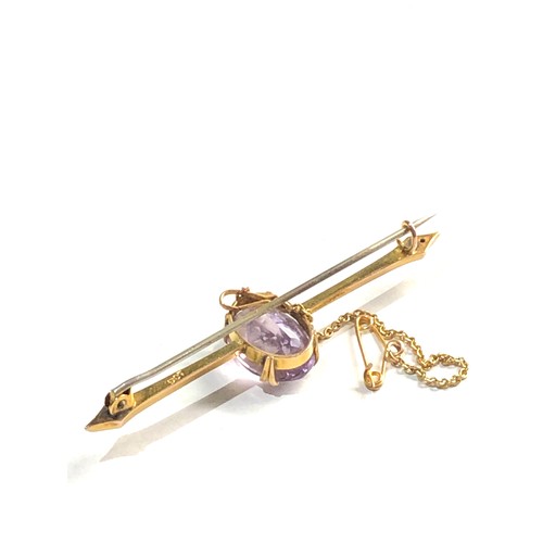 278 - 9ct gold amethyst bar brooch measures approx 6.1cm 4.2g