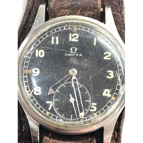 82 - Military Omega dirty dozen wristwatch in working order but no warranty given