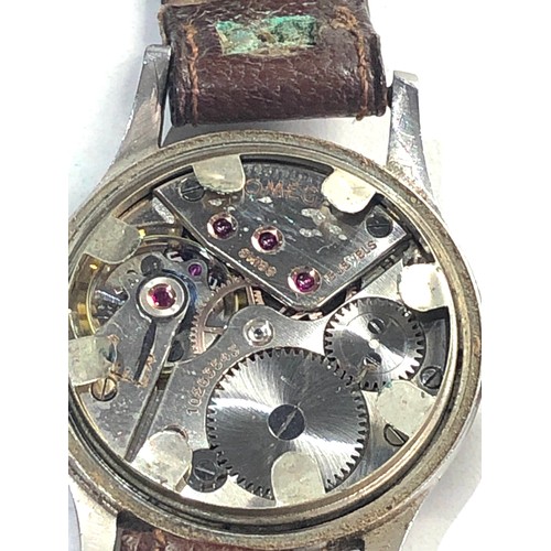 84 - Military Omega dirty dozen wristwatch in working order need minute hand attaching but no warranty gi... 