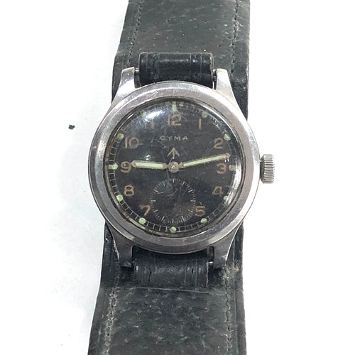 85 - Military cyma dirty dozen wristwatch in non working order no warranty given missing second hand