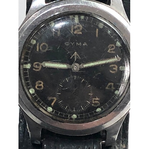 85 - Military cyma dirty dozen wristwatch in non working order no warranty given missing second hand