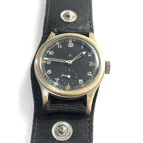 86 - Military Record dirty dozen wristwatch in working order but no warranty given