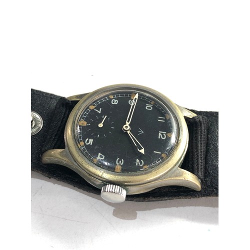 86 - Military Record dirty dozen wristwatch in working order but no warranty given